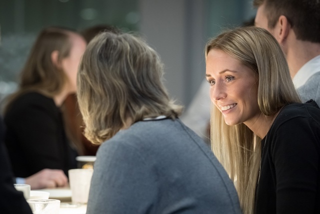 People smiling at the meeting