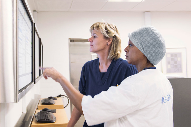 Nurses using a monitor