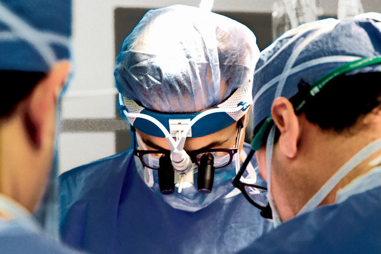 Surgeons operating